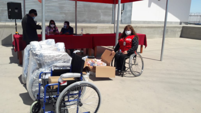 silla de ruedas y kits de víveres