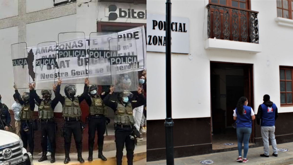 Foto de policías levantando sus escudos para cubrir pancarta