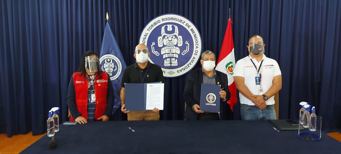 representantes del conadis y la universidad