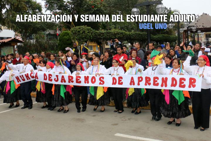 Fiesta de la alfabetización y estudiante adulto en lurín