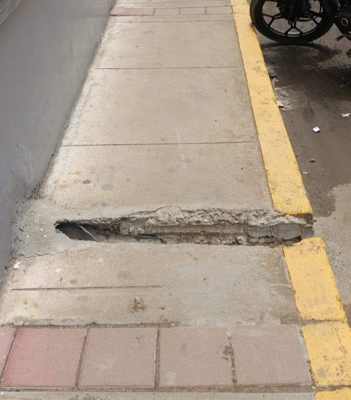 La empresa rompió la vereda para evacuar las aguas de lluvia
