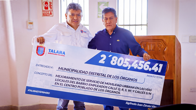 Entrega de cheque en Los Órganos.