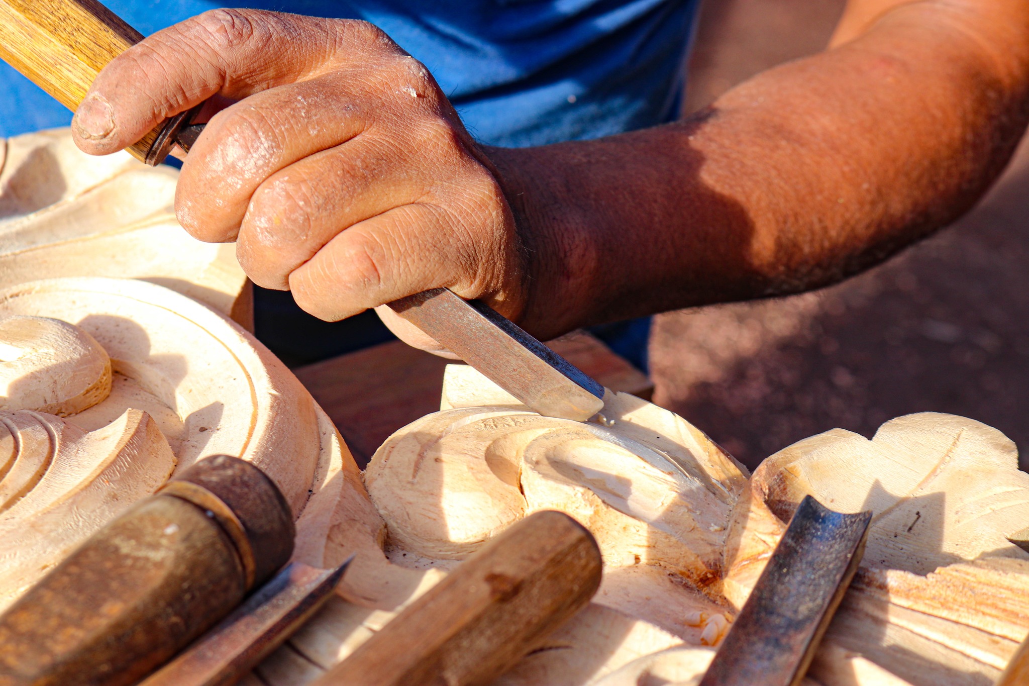 Arte de tallado de madera en Huamanguilla