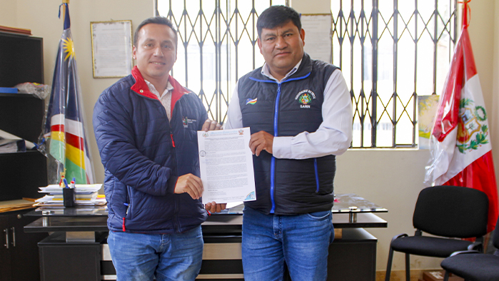 imagen de la firma del convenio entre las dos instituciones