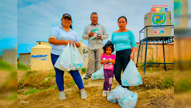 ¡Trabajando por los más necesitados! Entrega de alimentos a los integrantes del programa vaso de leche 