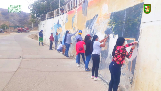 Foto, Trabajos comunales se realizan en el muro del barrio Santa Rosa