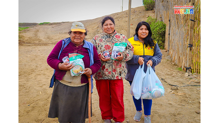Entrega de alimentos a los integrantes del Programa Vaso de Leche, correspondiente al mes de julio