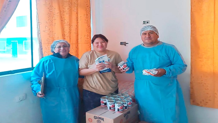 entrega de productos del programa del vaso de leche