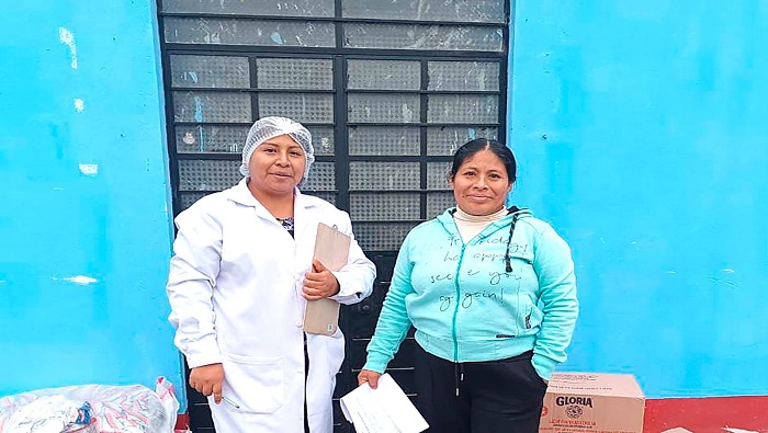 entrega de productos del programa del vaso de leche