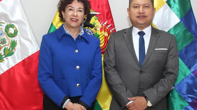 Representante de la UPB con Encargado de Negocios
