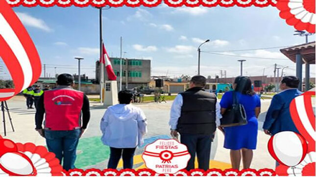 autoridades de la comuna observando la bandera nacional 