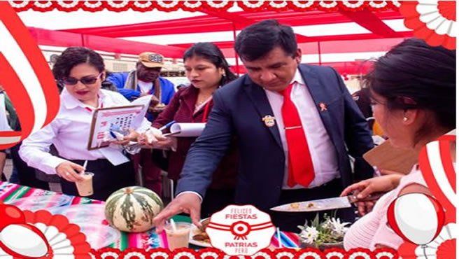 la autoridad de la comuna degustando el plato típico
