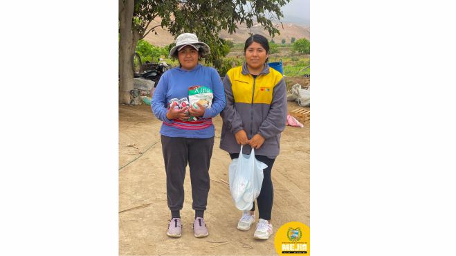 Entrega de alimentos a los integrantes del Programa Vaso de Leche, correspondiente al mes de noviembre