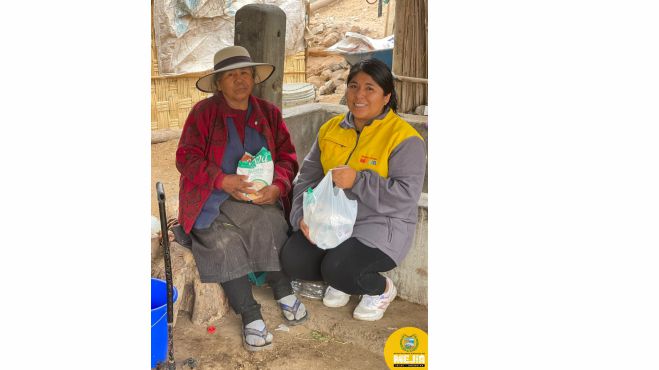 Entrega de alimentos a los integrantes del Programa Vaso de Leche, correspondiente al mes de noviembre