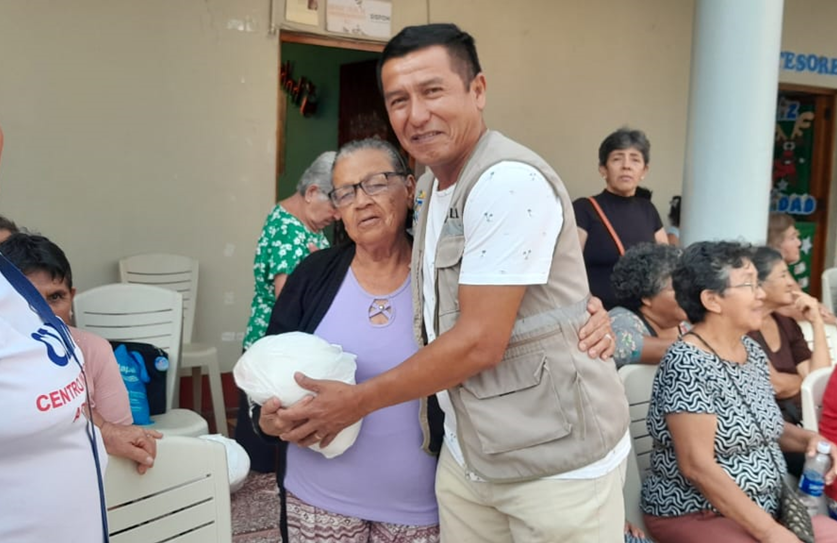 Archivo JPG de la donación de arroz al adulto mayor.