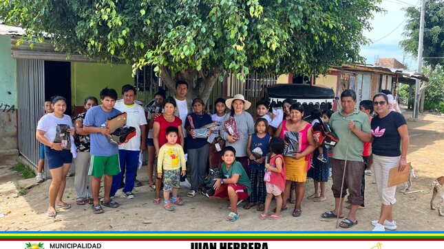 Archivo JPG de la repartición de donación de ropa y calzado.