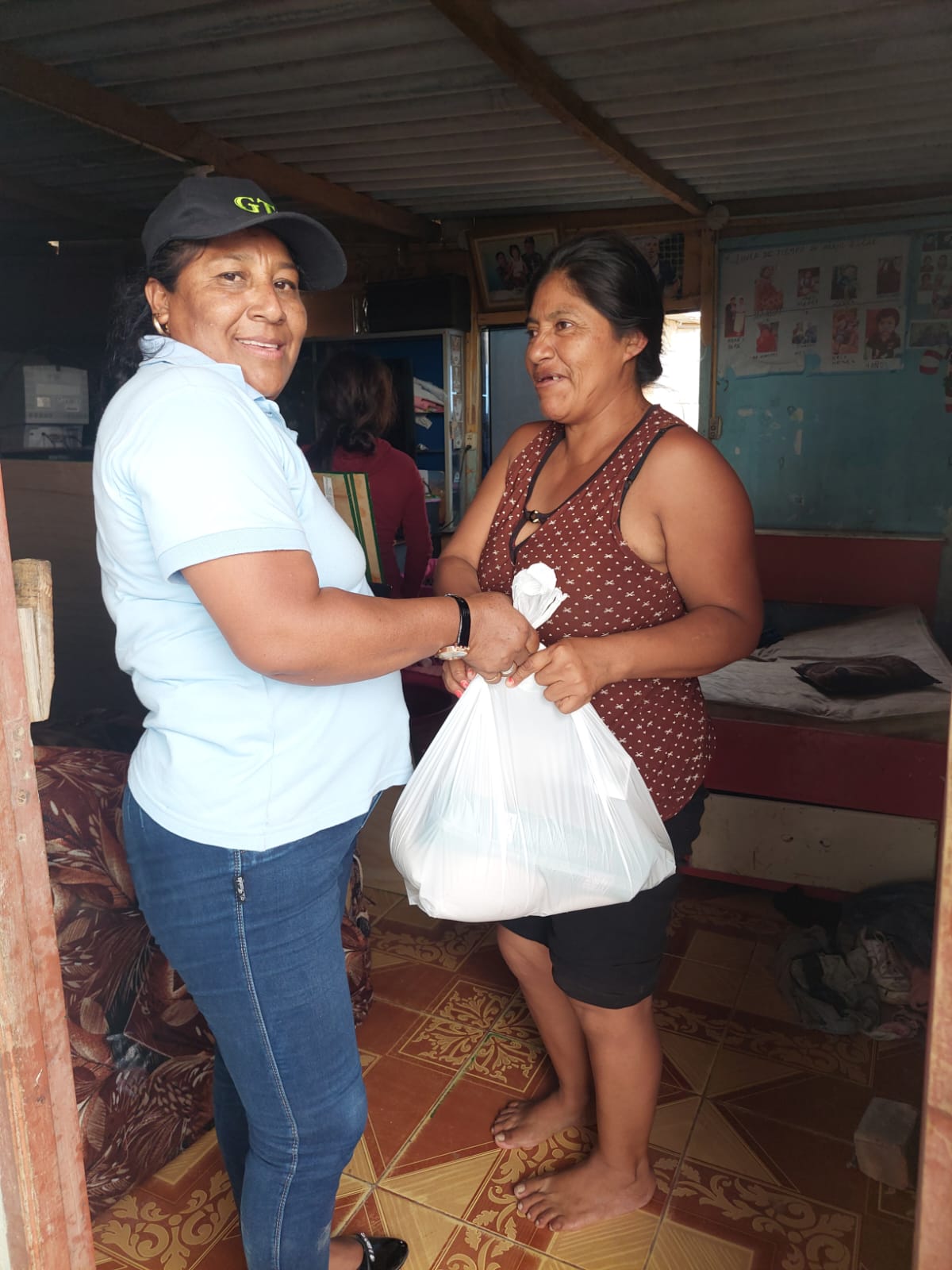 Archivo JPG de entrega de viveres a vecinos de OMAPED