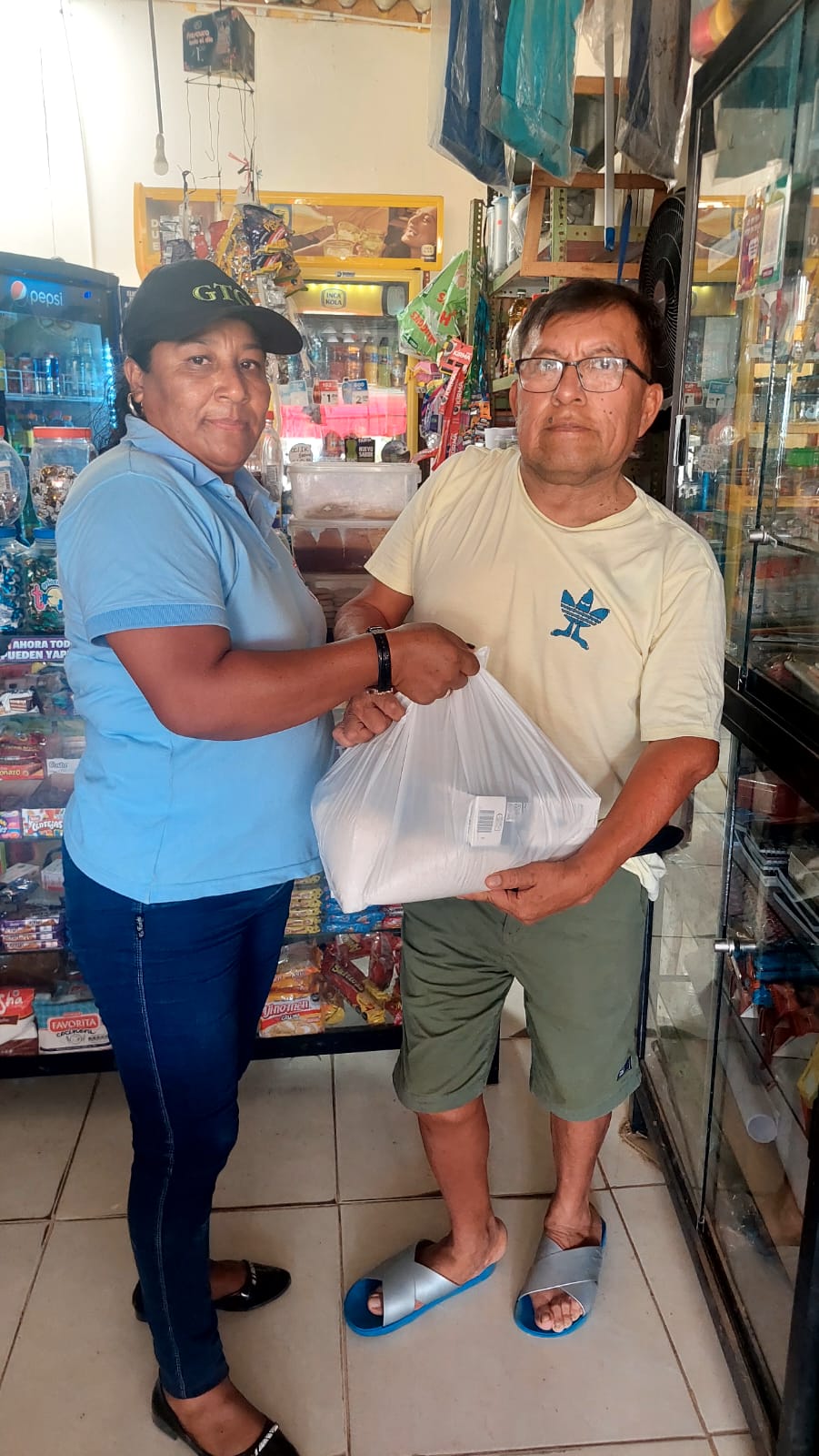Archivo JPG de entrega de viveres a vecinos de OMAPED