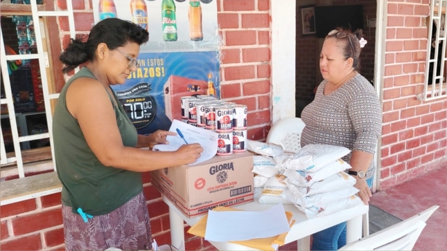 Foto Reparto de insumos del vaso de leche