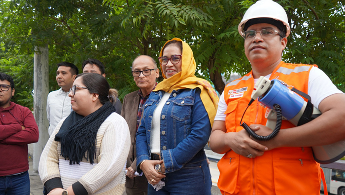 Director y trabajadores